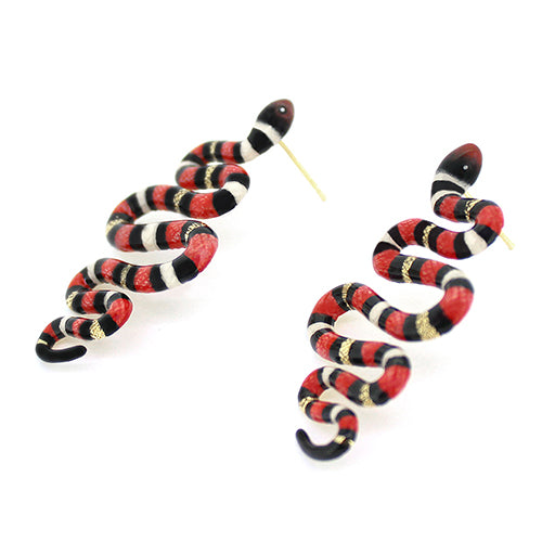 Nature-inspired earrings featuring red milk snake with black and white stripes.