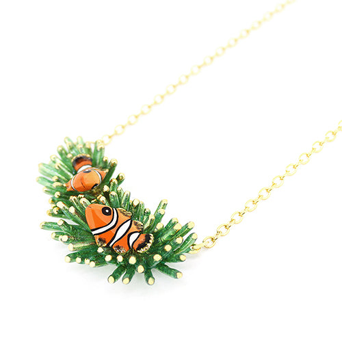 Unique handmade necklace with clownfish and green coral design.