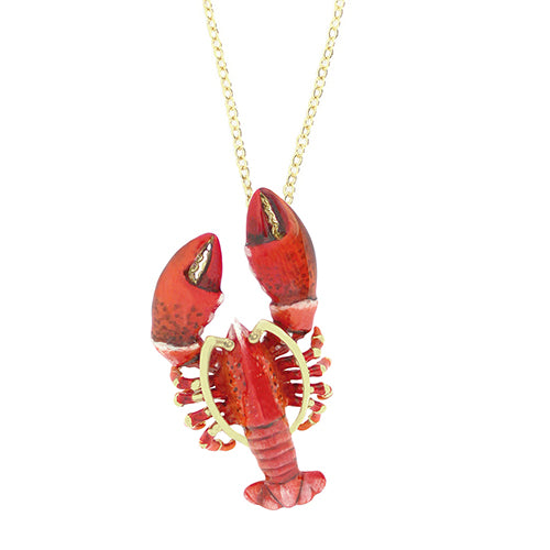 Red lobster-shaped pendant necklace with gold accents on a delicate chain.