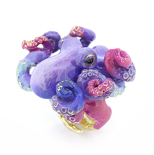 Handmade octopus ring, featuring vibrant colors and intricate detailing.