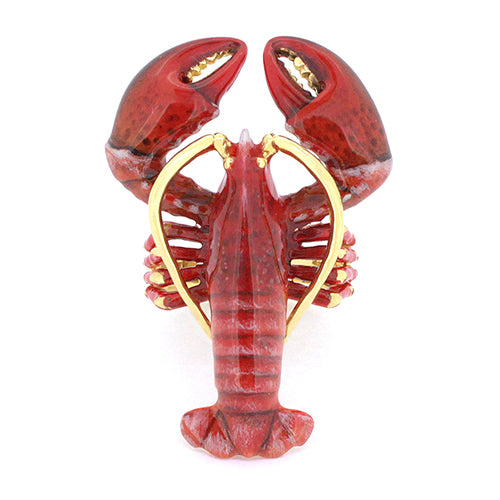 A whimsical lobster ring featuring a vivid red lobster design with gold accents.