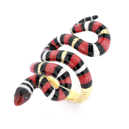 Handcrafted red milk snake ring featuring black and white stripes.