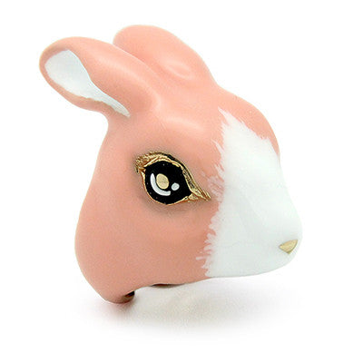 A cute ring of an orange pink bunny with large, expressive eyes.