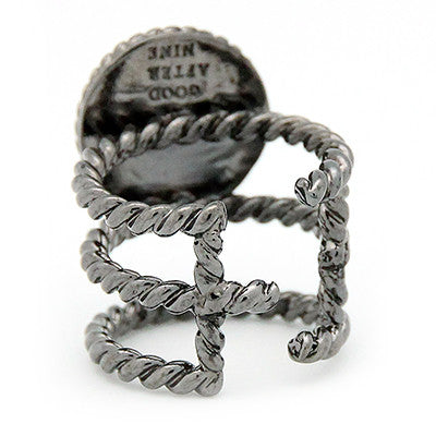 Unique ring with a braided rope design and a moon-like pearl.