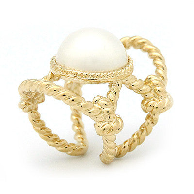 Beautiful gold ring with a large costume pearl surrounded by twisted rope design.