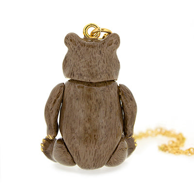 Golden necklace featuring a bear-shaped pendant, perfect for animal loves.