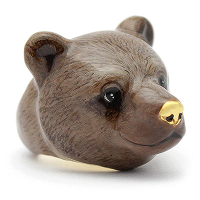 Bear-shaped ring with detailed facial features, including a gold nose and expressive eyes.