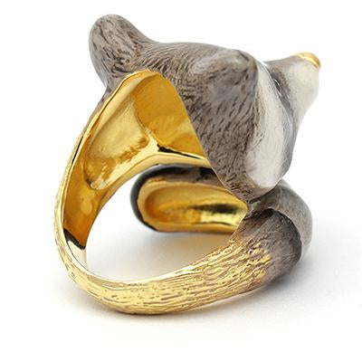 Handcrafted ring designed as a raccoon's head, featuring the band elegantly wraps around the back, resembling its tail.