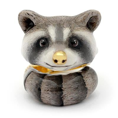 Adorable ring designed as a raccoon's head, featuring detailed eyes and a nose 