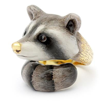 Adorable ring designed as a raccoon's head, featuring detailed eyes and a nose, perfect for animal lovers.