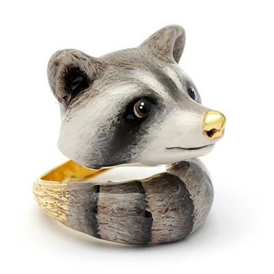 Handcrafted ring designed as a raccoon's head, featuring the band elegantly wraps around the back, resembling its tail.