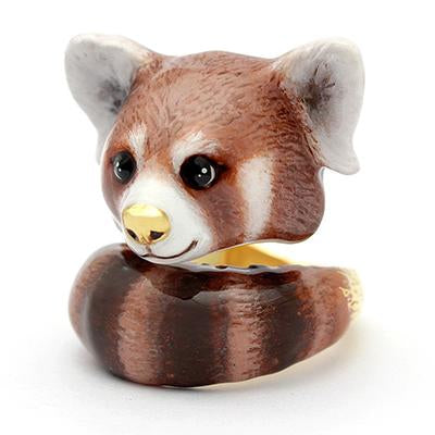 Adorable ring designed as a red panda's head, featuring detailed eyes and a nose, perfect for animal lovers.
