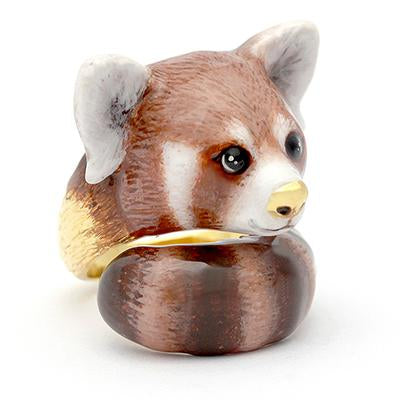 A ring designed as a red panda's head, featuring the band elegantly wraps around the back, resembling its tail.