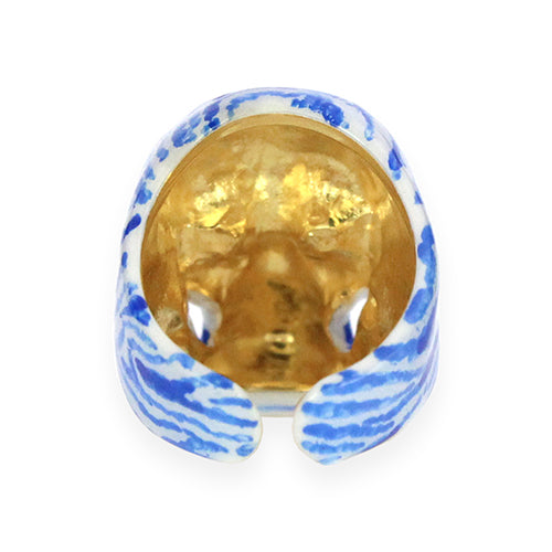 Hand-painted skull ring featuring a unique zebra pattern in blue and white.