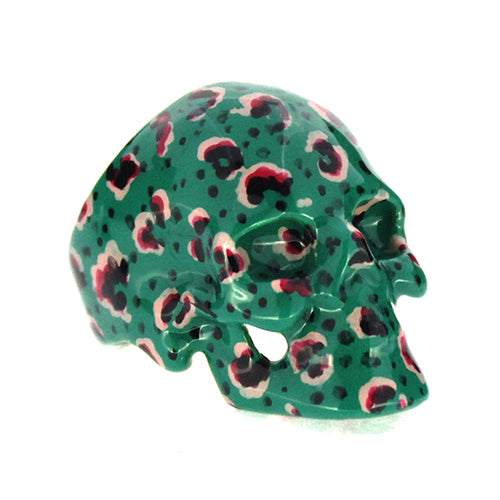 Eye-catching skull ring with a green base and leopard pattern design.