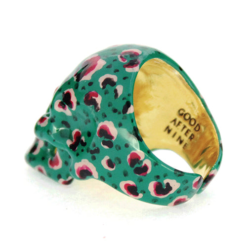 Eye-catching skull ring with a green base and leopard pattern design.