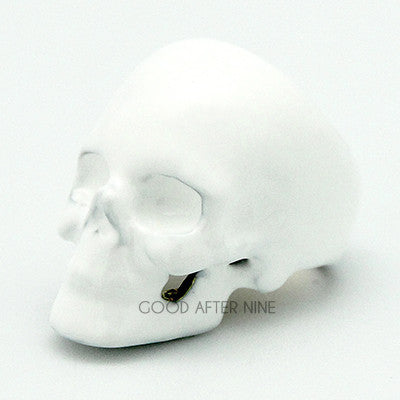 Unique white skull ring featuring a defined facial features, perfect for skull lovers.