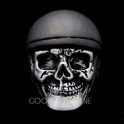 Artisan skull ring featuring a realistic skull design topped with a grey helmet.