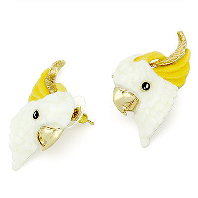 Handmade bird earrings featuring a cockatoo design with yellow and white detailing.