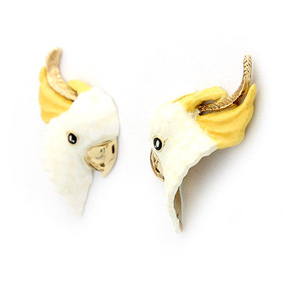 Handmade bird earrings featuring a cockatoo design with yellow and white detailing, perfect for animal lovers.