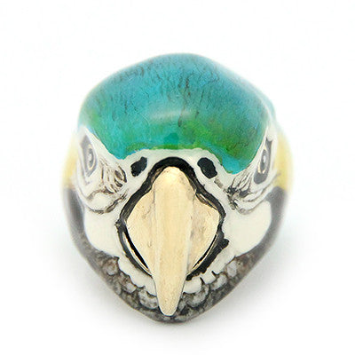 Handcrafted ring featuring a colorful parrot.