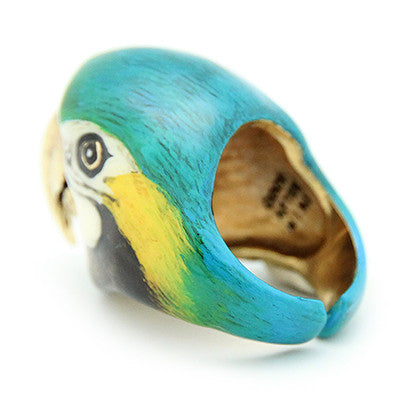 Handcrafted ring featuring a colorful parrot, perfect for animal lovers.