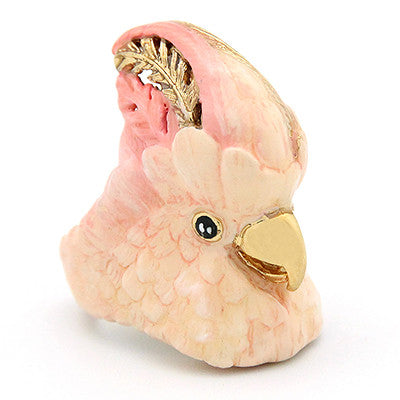 Beautiful cockatoo-shaped ring in soft pink and gold tones, perfect for bird lovers.