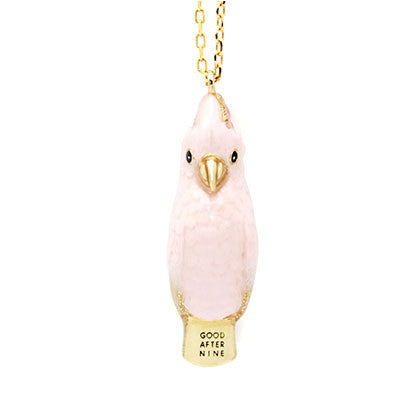 Charming cockatoo-shaped whistle necklace with a gold chain.