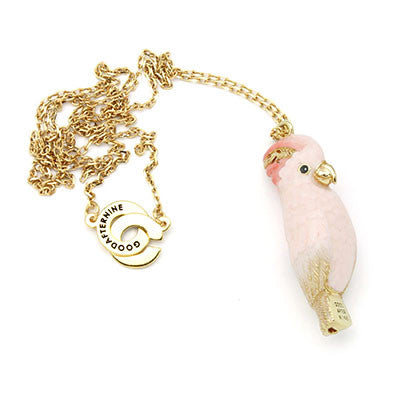 Handcrafted cockatoo-shaped whistle necklace with a gold chain, perfect for animal lovers.