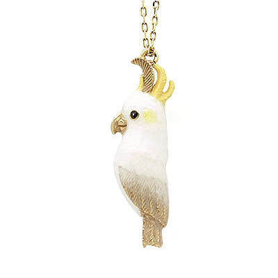 Charming necklace featuring a cockatoo-shaped whistle pendant.