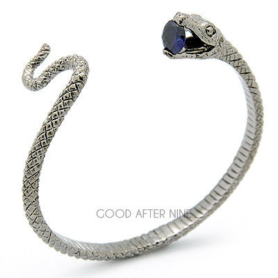 Unique snake bangle with a blue gemstone at its mouth, perfect for animal lovers.