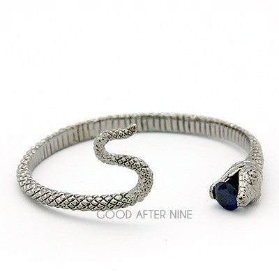 Unique snake bangle with a blue gemstone at its mouth