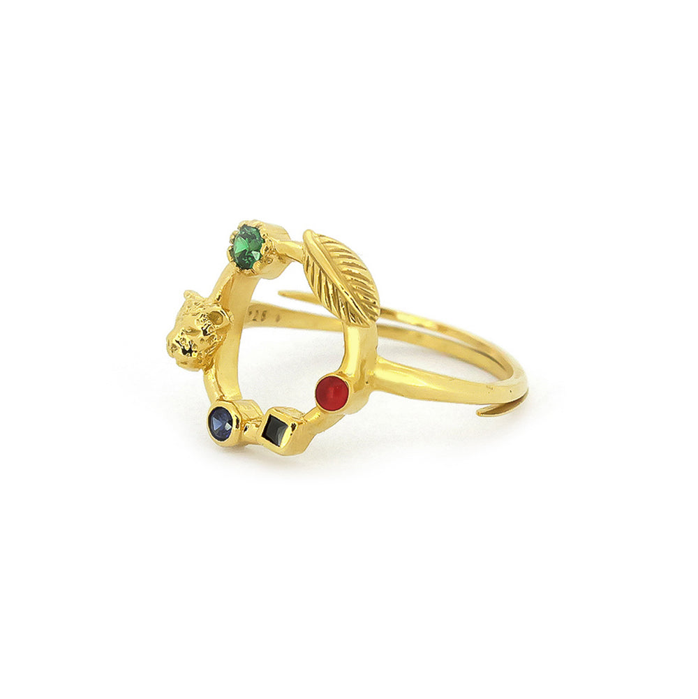 A unique golden ring featuring a leopard head and colorful stones.