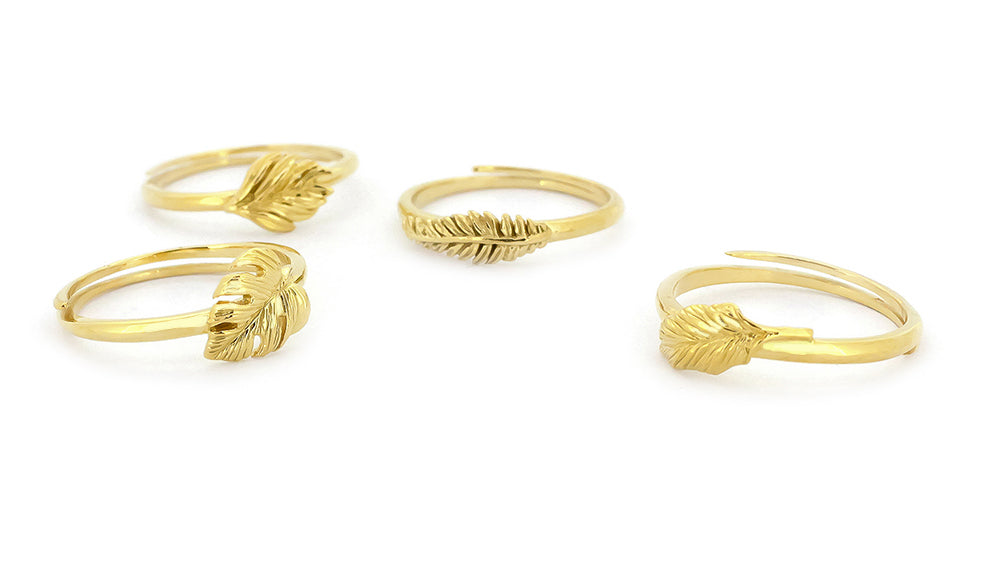 Unique gold rings showcasing beautiful leaf designs.