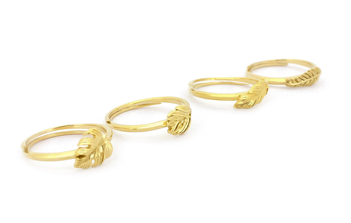 Unique gold rings showcasing beautiful leaf designs.