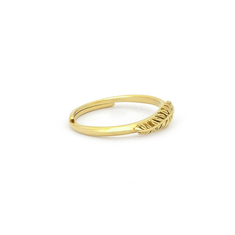 Stylish minimalist gold ring with a leaf motif