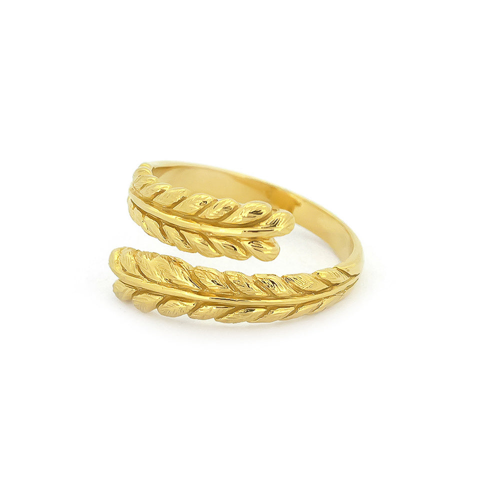 Beautiful twisted gold ring showcasing intricate leaf patterns