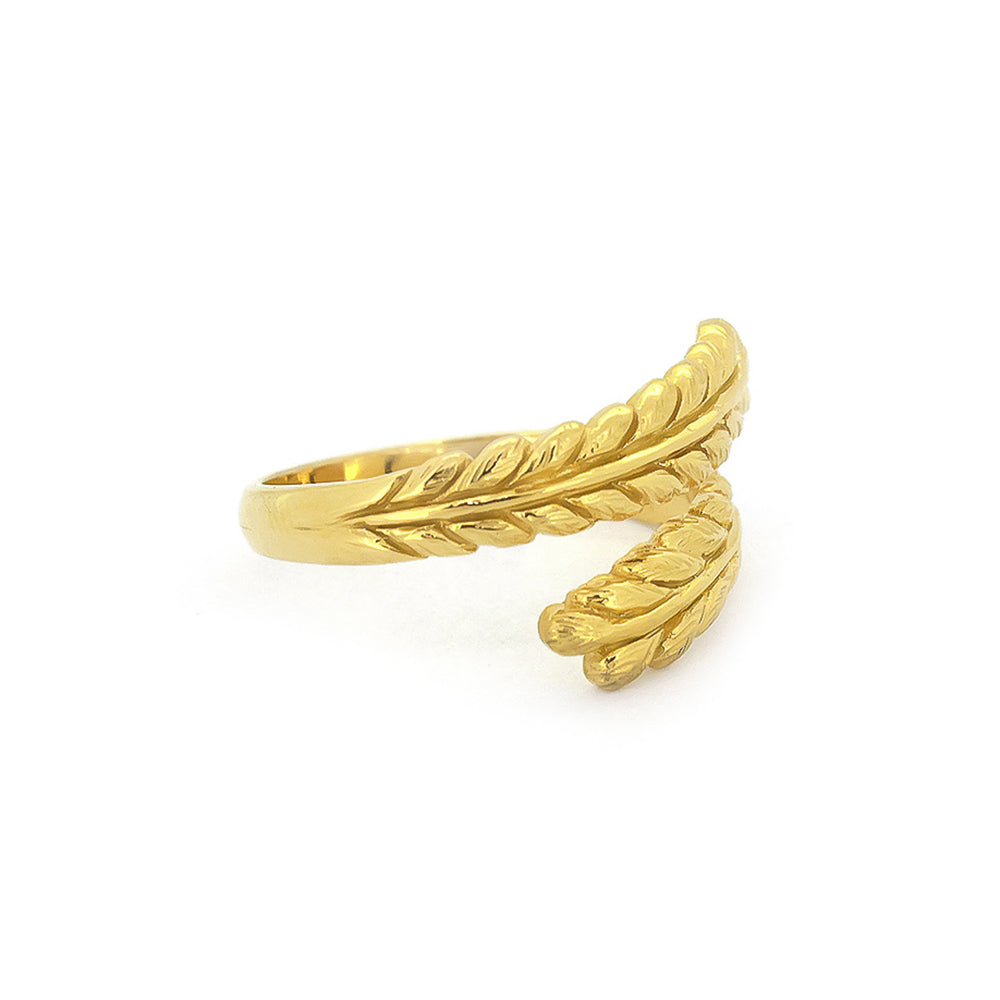 Beautiful twisted gold ring showcasing intricate leaf patterns