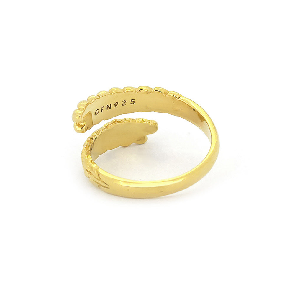 Beautiful twisted gold ring showcasing intricate leaf patterns