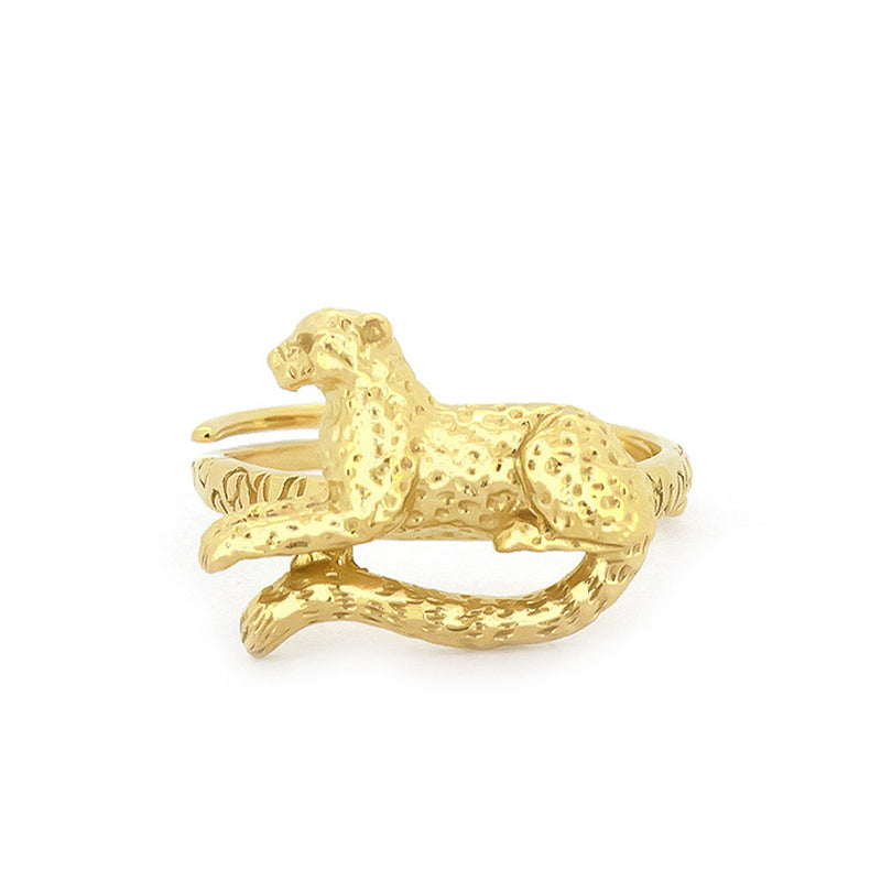 A gold ring featuring a detailed, leopard design, perfect for unique jewelry lovers.