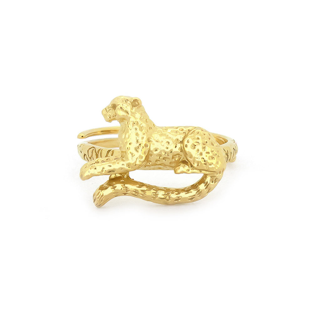 A gold ring featuring a detailed, leopard design, gracefully curled around the band, showcasing its elegant form.