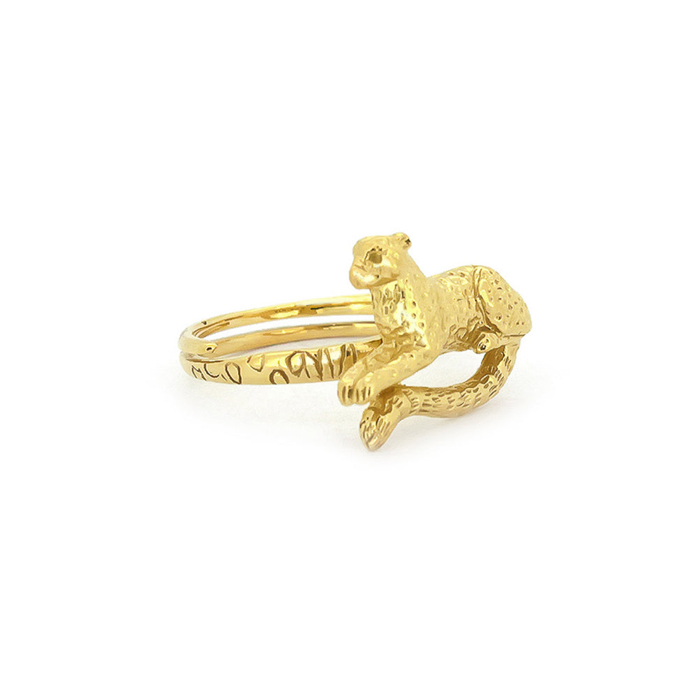 A gold ring featuring a detailed, leopard design, perfect for unique jewelry lovers.