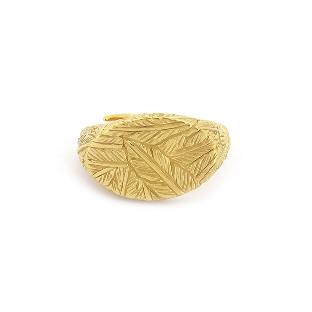 Beautiful gold ring with distinct textures, featuring a feather pattern.