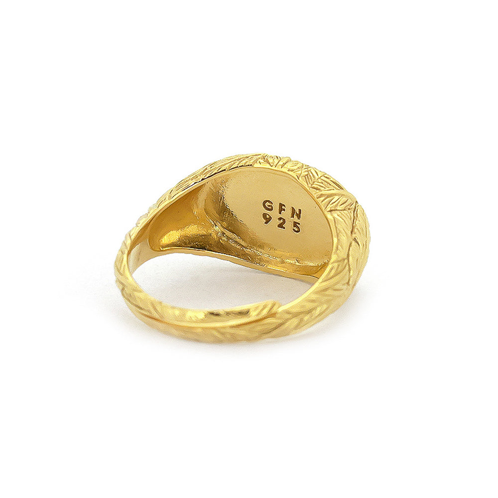 Beautiful gold ring with distinct textures, featuring a feather pattern.