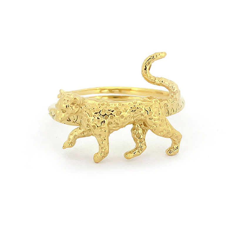 A gold ring featuring a textured, walking leopard design, showcasing a playful its pose on a band.