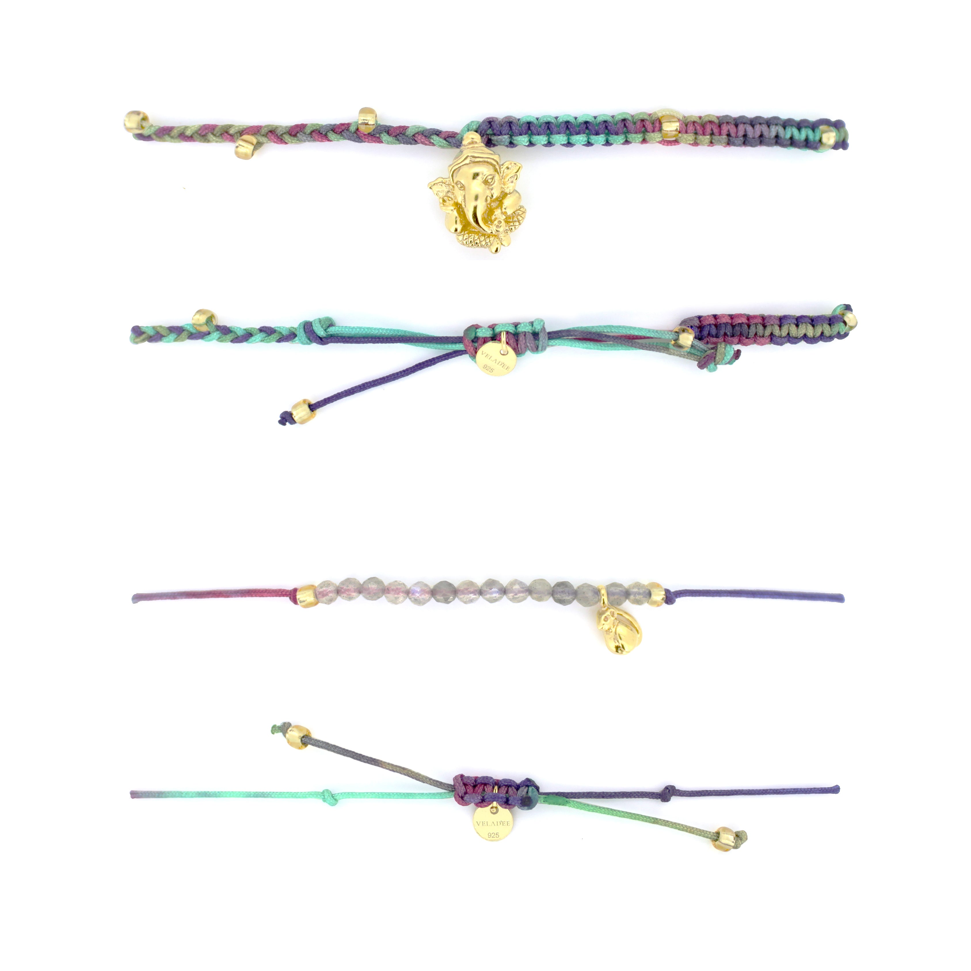 Elegant Ganesh charm bracelet set featuring colorful threads