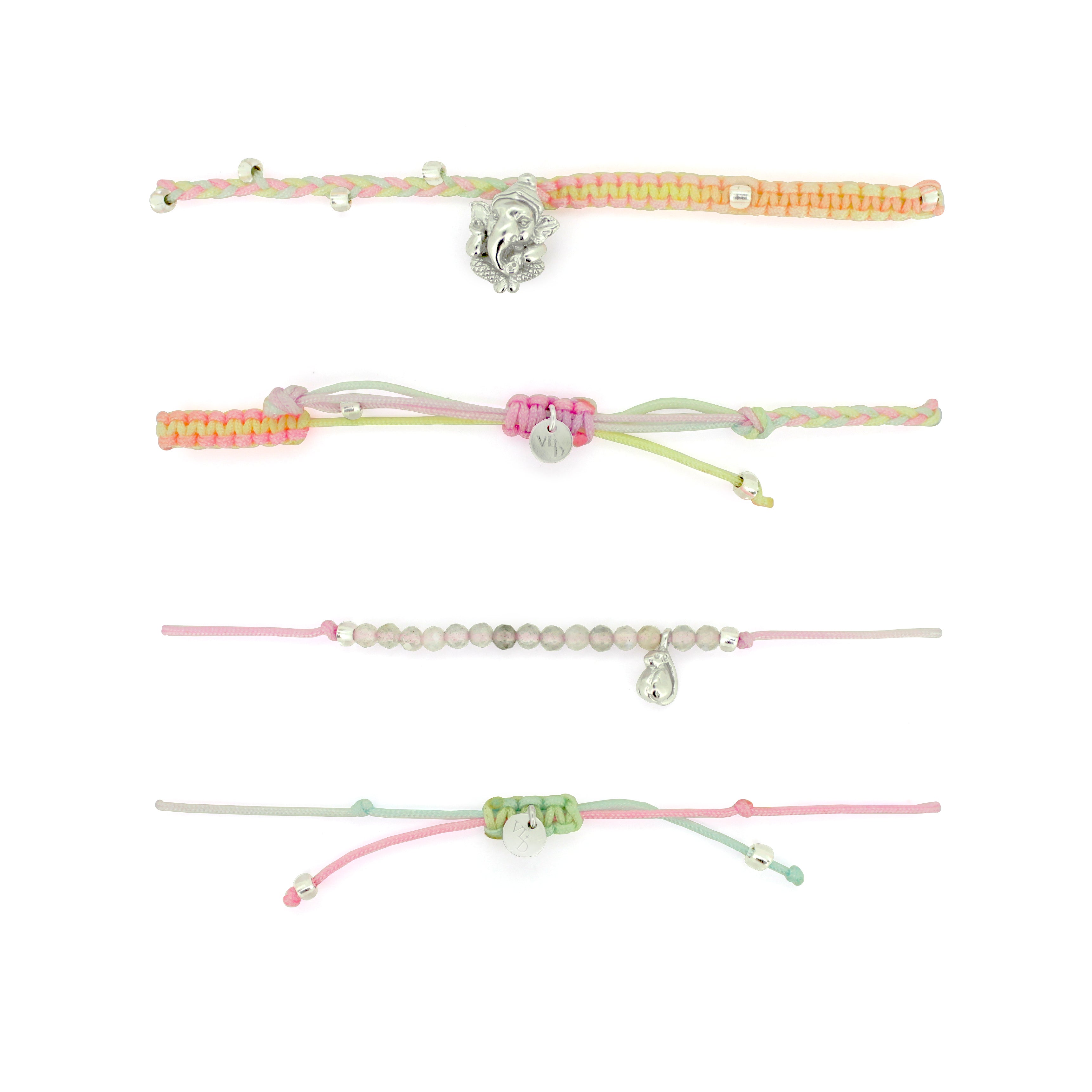 Pastel Ganesh and Musika charm bracelet set featuring intricate designs.