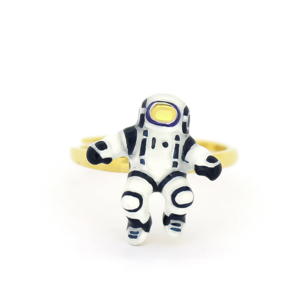 Unique gold ring featuring an astronaut design.