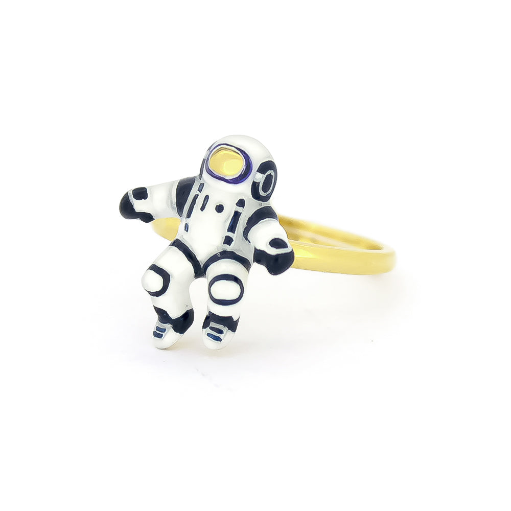 Unique gold ring featuring an astronaut design.