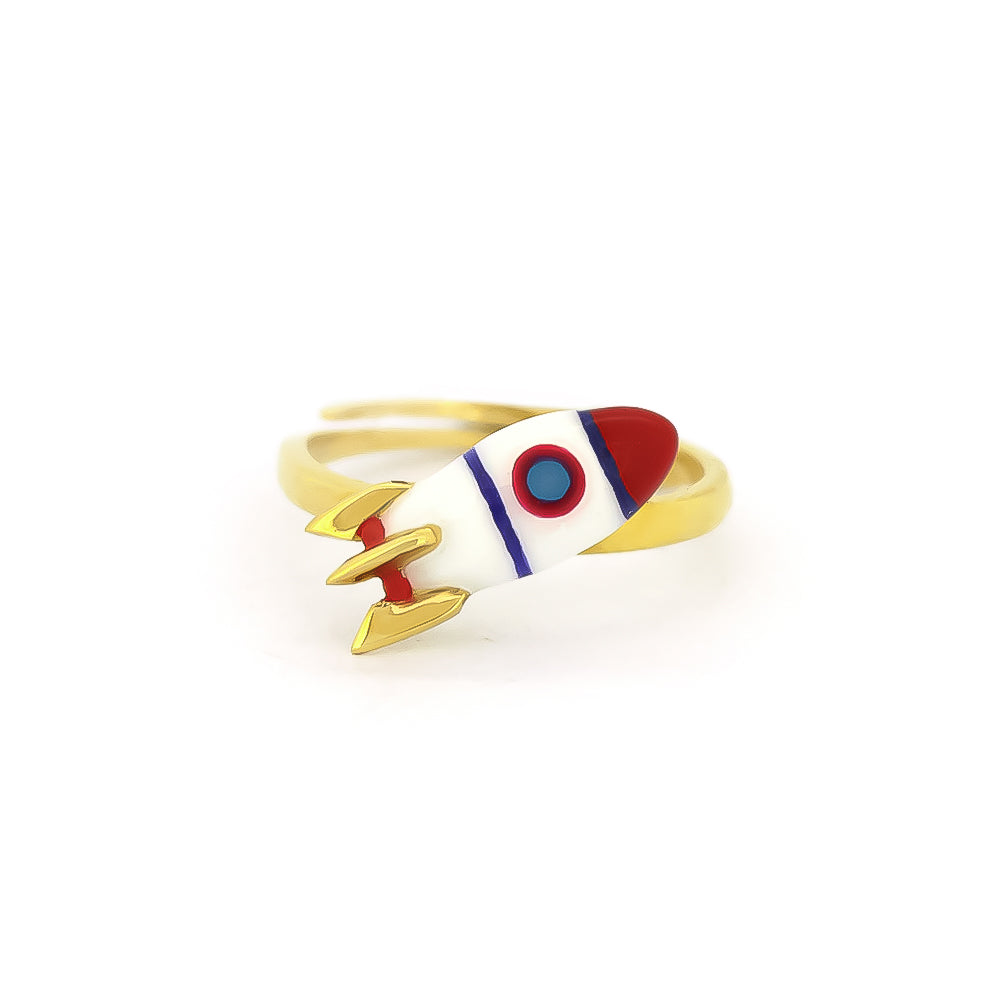 Adorable gold ring featuring a rocket design, perfect for jewelry lovers.